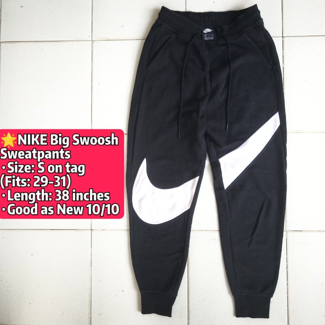 NIKE Big Swoosh Sweatpants - Black (Category: Joggers) located in Tagum. Submitted by rednaxer05 (Listing ID 1463448201, Image 1). Description: - Black Nike sweatpants - Big white swoosh logo - Size S on tag - Fits waist 29-31 inches - Total length: 38 inches.