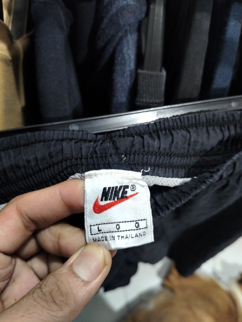 Nike Black Athletic Shorts Size L (Category: Shorts) located in Manila. Submitted by keenfire-60d44d (Listing ID 1463507940, Image 2). Description: - Brand: Nike - Type: Athletic Shorts - Size: Large (L) - Color: Black - Features: Elastic waistband for comfort, classic Nike logo on leg - Origin: Made in Thailand - Ideal for: Workouts, gym sessions, casual wear.