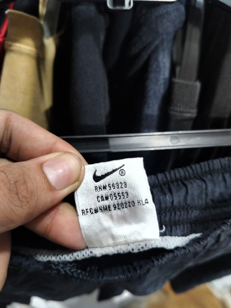 Nike Black Athletic Shorts Size L (Category: Shorts) located in Manila. Submitted by keenfire-60d44d (Listing ID 1463507940, Image 3). Description: - Brand: Nike - Type: Athletic Shorts - Size: Large (L) - Color: Black - Features: Elastic waistband for comfort, classic Nike logo on leg - Origin: Made in Thailand - Ideal for: Workouts, gym sessions, casual wear.