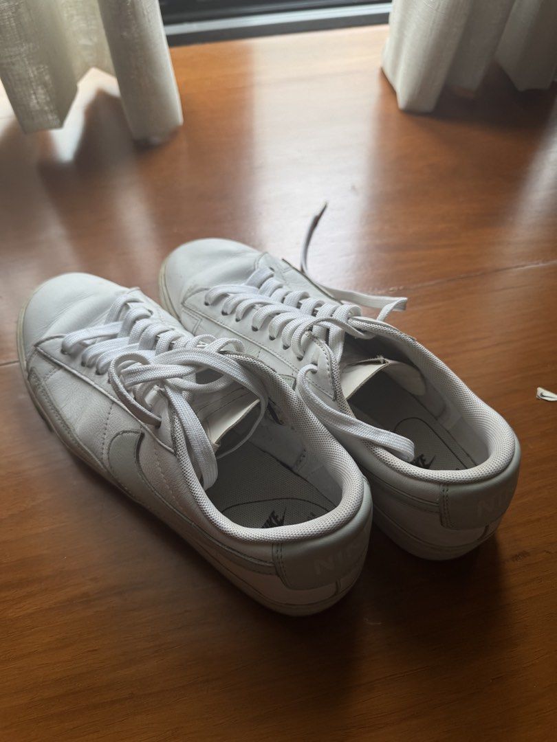 Nike Blazer Low Leather White Sneakers (Category: Sneakers) located in Pasig City. Submitted by kutleyn (Listing ID 1463377991, Image 2). Description: - Classic white Nike Blazer Low sneakers - Leather upper - US Size 8 / EUR 39 - Perfect for everyday wear - Soles show some wear but have plenty of life left - Versatile addition to your sneaker collection.