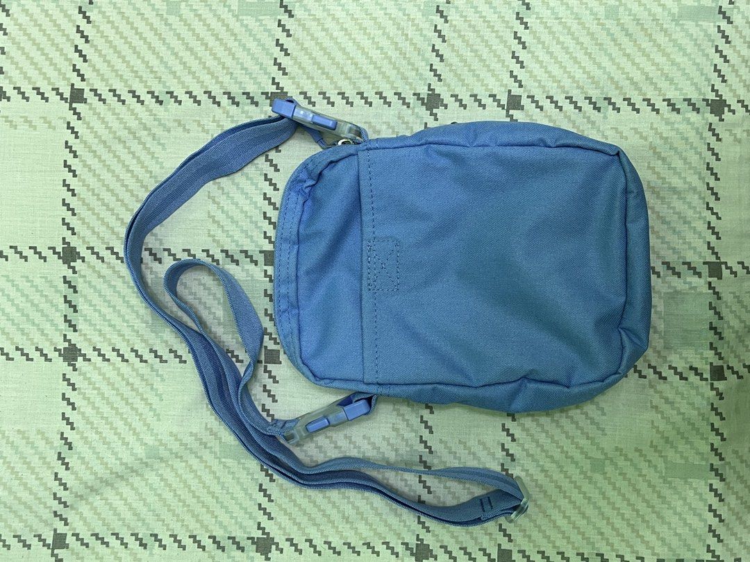 Nike Blue Crossbody Bag (Category: Sling Bags) located in Dasmarinas. Submitted by gmxngmmd (Listing ID 1463528481, Image 2). Description: Nike Blue Crossbody Bag - Main zippered compartment - Front zippered pocket - Adjustable strap - Ideal for everyday use - Small and compact design Height: 23 cm (approx. 9 inches) Width: 16 cm (approx. 6 inches) Depth: 8 cm (approx. 3 inches) Total Capacity: 4 Liters Material: 100% Polyester (made with at leas