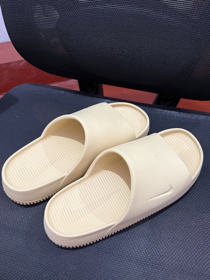 Nike Calm Slides - Sail (Size M8/W9) (Category: Slippers & Slides) located in Quezon City. Submitted by mmbjr (Listing ID 1463456878, Image 1). Description: Selling my original Nike Calm Slides in Sail. - size: M8 / W9 - color: - used but in very good condition - clean and well maintained - no box - no major damage.