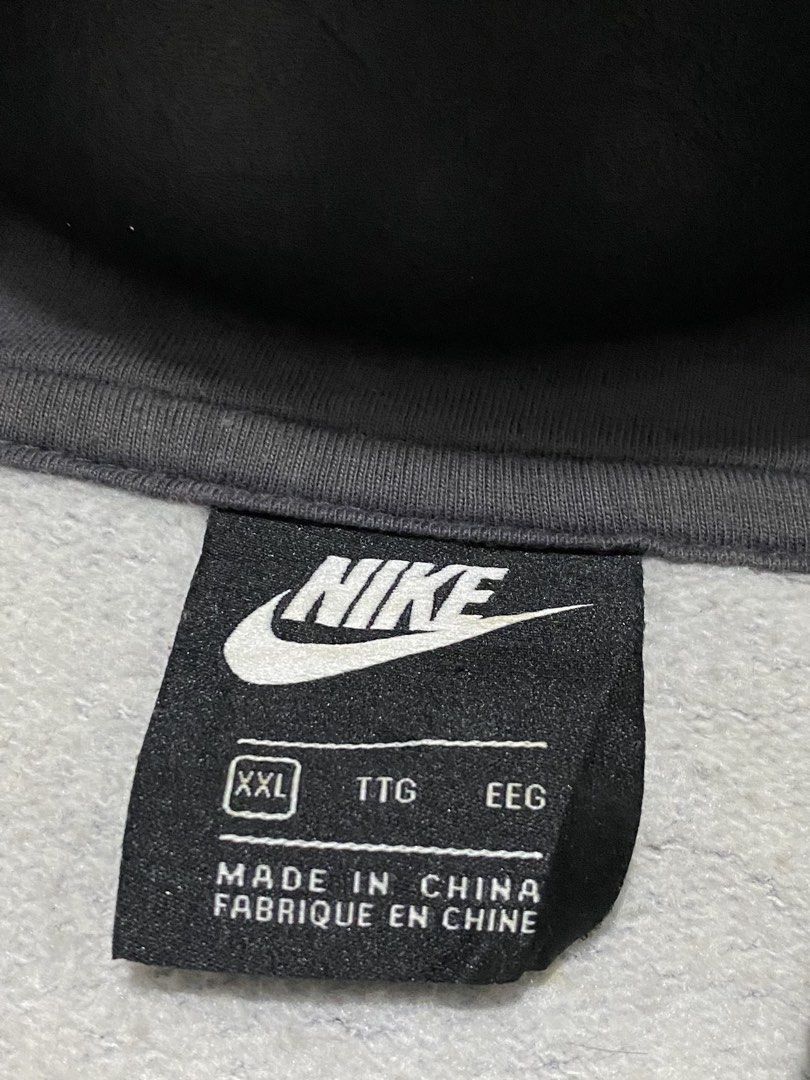 Nike Camo Full Zip Hoodie (Category: Coats, Jackets and Outerwear) located in Manila. Submitted by urboycee (Listing ID 1463485924, Image 3). Description: - Grey and black camouflage Nike hoodie - Size XXL - Full zip closure - Features pockets - Perfect for casual wear or layering - Made in China - Please check photos for detailed condition.