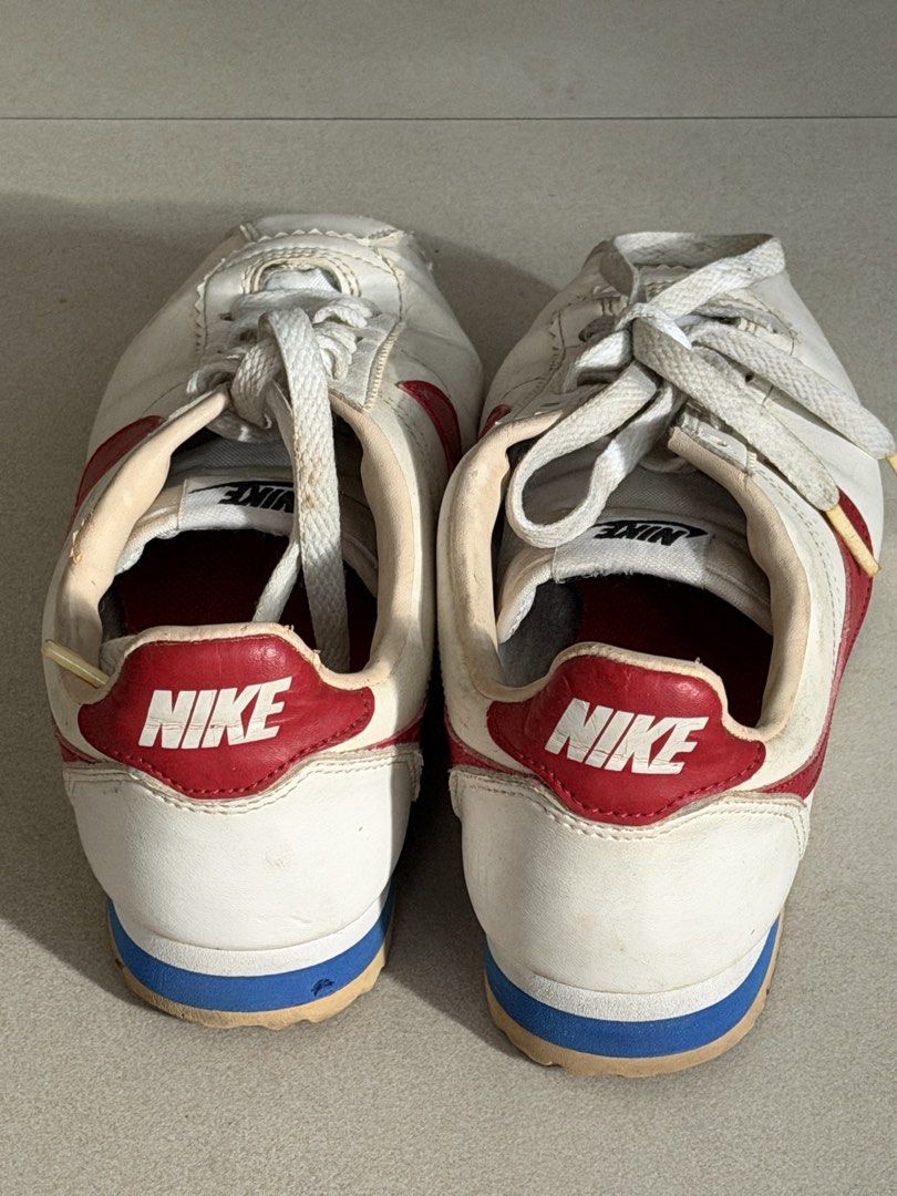 Nike Cortez White Red Blue Leather Sneakers (Category: Sneakers) located in Taguig. Submitted by anxmz (Listing ID 1463407907, Image 3). Description: - Classic Nike Cortez sneakers - Color: White leather with red swoosh and accents - Midsole detail: Blue stripe - Size: 38 EUR / 24 CM - Origin: Made in Indonesia.