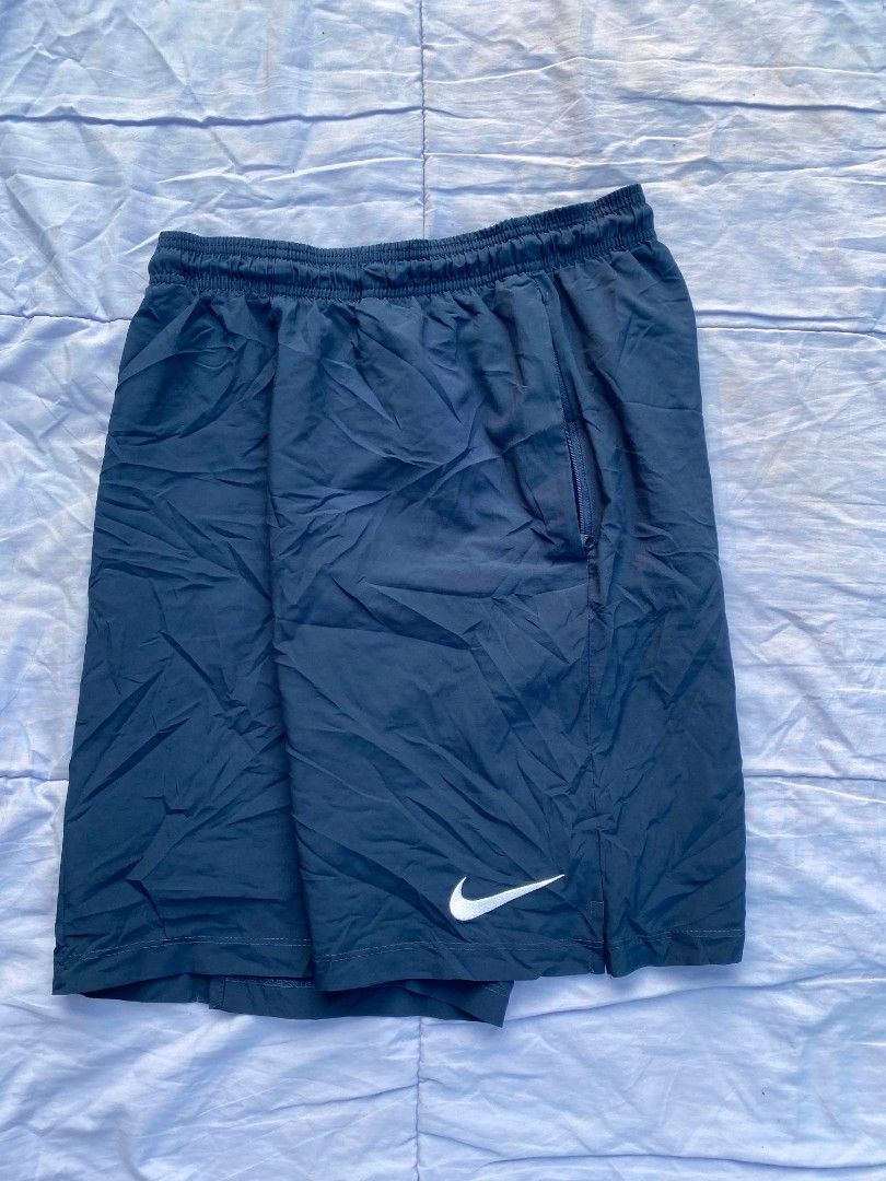 Nike Dri-Fit Shorts Size S (Category: Shorts) located in Manila. Submitted by mightywind_9ddae6 (Listing ID 1463487909, Image 3). Description: - Nike Dri-Fit Shorts - Size: S - Color: Dark blue/grey - Features: Pockets, drawstring - Ideal for: Sports, casual wear - Origin: Made in Indonesia.