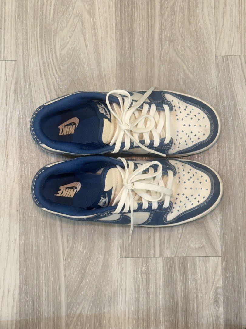Nike Dunk Low (Category: Sneakers) located in Manila. Submitted by silent_dosss (Listing ID 1463378309, Image 3). Description: - Nike Dunk Low sneakers - Colorway: White and Blue - Unique cross stitch pattern on toe box and side panels - Classic Nike swoosh branding - Lace-up closure for a secure fit - Ideal for casual wear and everyday styling.