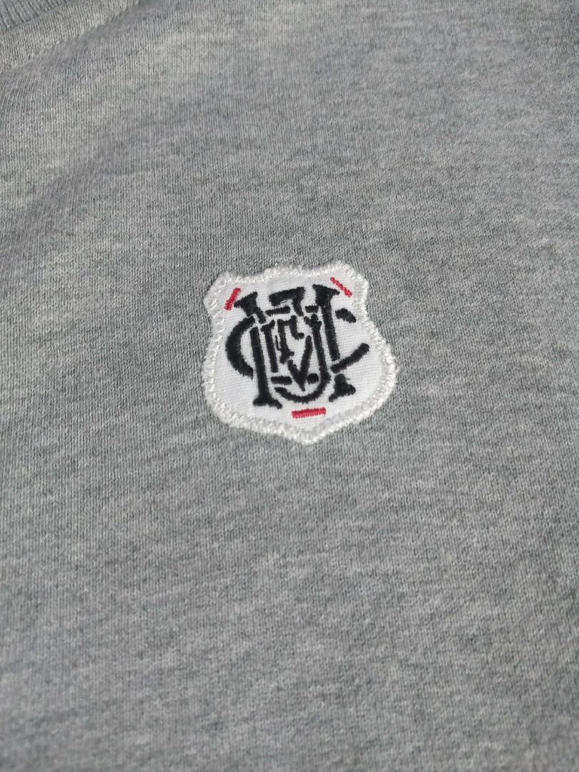Nike Grey Track Jacket with Crest Logo (Category: Coats, Jackets and Outerwear) located in Pasig City. Submitted by rjkfindsofficial (Listing ID 1463405490, Image 3). Description: - Grey Nike track jacket - Size: L - Dimes L27 x W20 - Features a small embroidered crest logo on the chest - Full zip closure - Includes pockets - Made in China - Ideal for casual wear or sports activities - All zipper working - Complete tags - Minimal stain - Ribbings