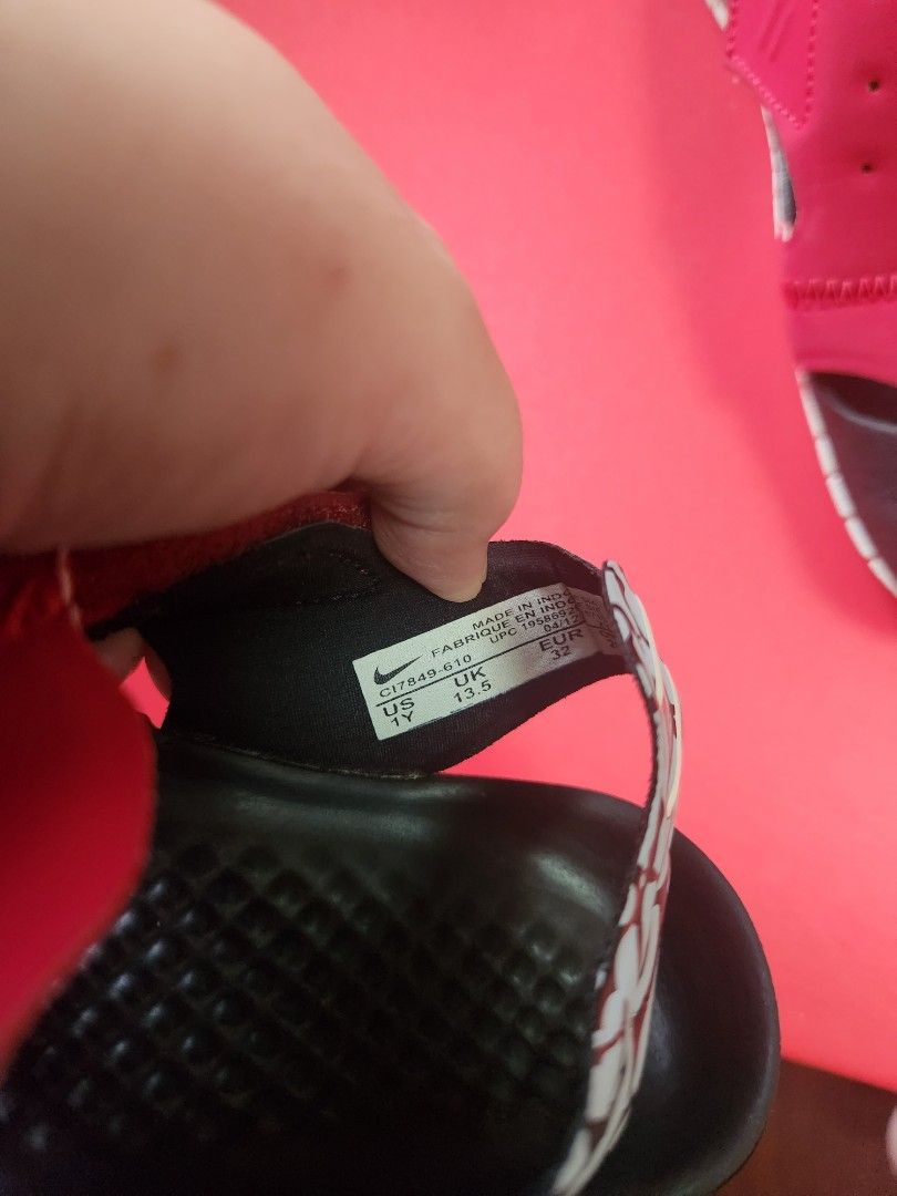 Nike Jordan Kids Sandals (Category: Babies & Kids Fashion) located in Makati City. Submitted by mikamix (Listing ID 1463365833, Image 3). Description: - Kids Jordan sandals in vibrant red and black. - Easy slip-on design with secure velcro strap. - Durable soles featuring the iconic Jordan Jumpman logo. - Fun words like 'Jump', 'Run', 'Dream', 'Skip' on the soles add a playful touch. - Ideal footwear for active and energetic kids. - Please check 