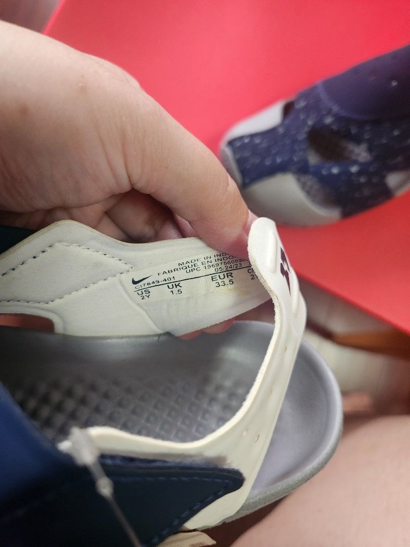 Nike Jordan Kids Sandals (Category: Babies & Kids Fashion) located in Makati City. Submitted by mikamix (Listing ID 1463366180, Image 3). Description: - Navy blue Jordan sandals for little ones - White speckle pattern - Easy strap closure for quick on and off - Fun words on soles: 'play', 'skip', 'jump', 'run', 'walk', 'learn' - Perfect for active kids - Comes with original tag size US 2Y.