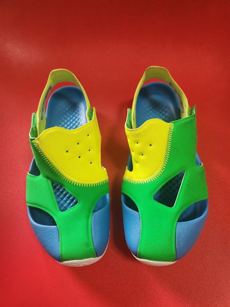 Nike Jordan Toddler Sandals (Category: Babies & Kids Fashion) located in Makati City. Submitted by mikamix (Listing ID 1463364901, Image 1). Description: - Toddler Nike Jordan Sandals - Vibrant Blue, Green, and Yellow colorway - Easy Velcro straps for a secure fit - Soles feature fun words: 'play', 'skip', 'run', 'walk', 'dream' - Ideal for active toddlers and summer fun size US 1Y.