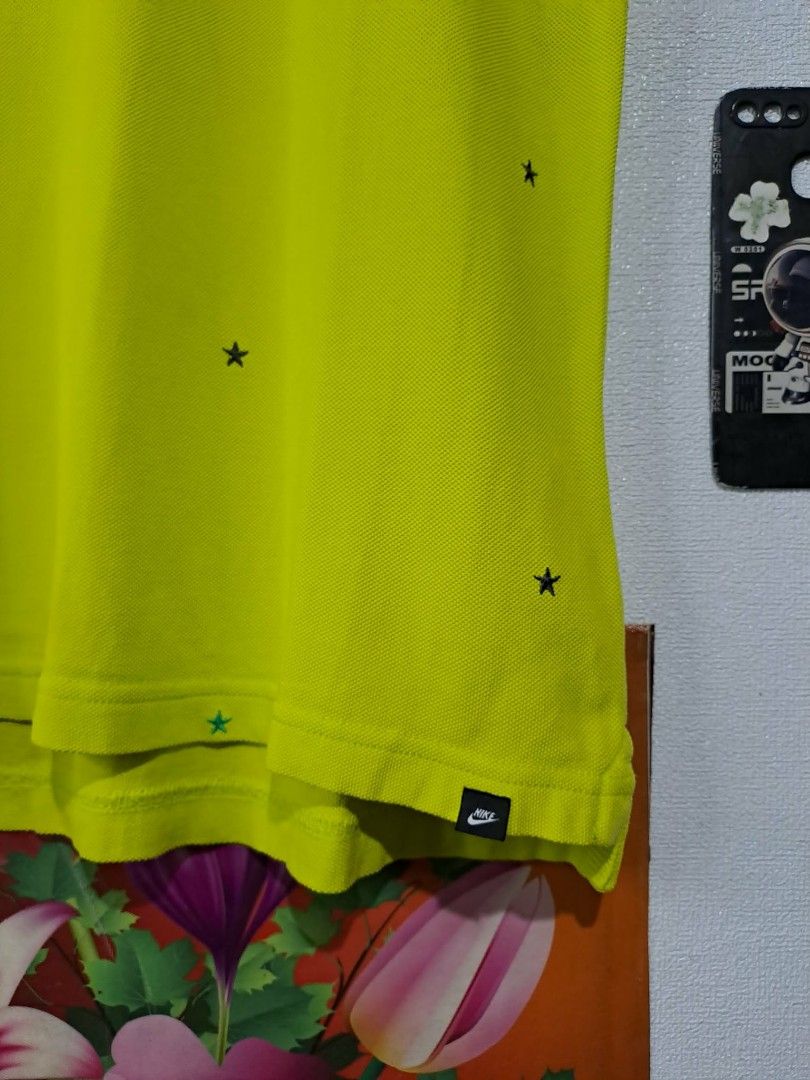 Nike Pinwheel Star Neon (Category: Activewear) located in Manila. Submitted by yaseen__73 (Listing ID 1463414196, Image 3). Description: Nike Sportswear Pinwheel Star Embroidered Polo Shirt, featuring a vibrant lime green/neon yellow base color. Wearing Size : Medium on Tag Dimensions : See Photo Color Rate : 9.9/10 - With Washable Stain - In Excellent Condition 450.00 shipped Via J&T Express Around Metro Manila MOP : G C A S H B A N K T R A N S 