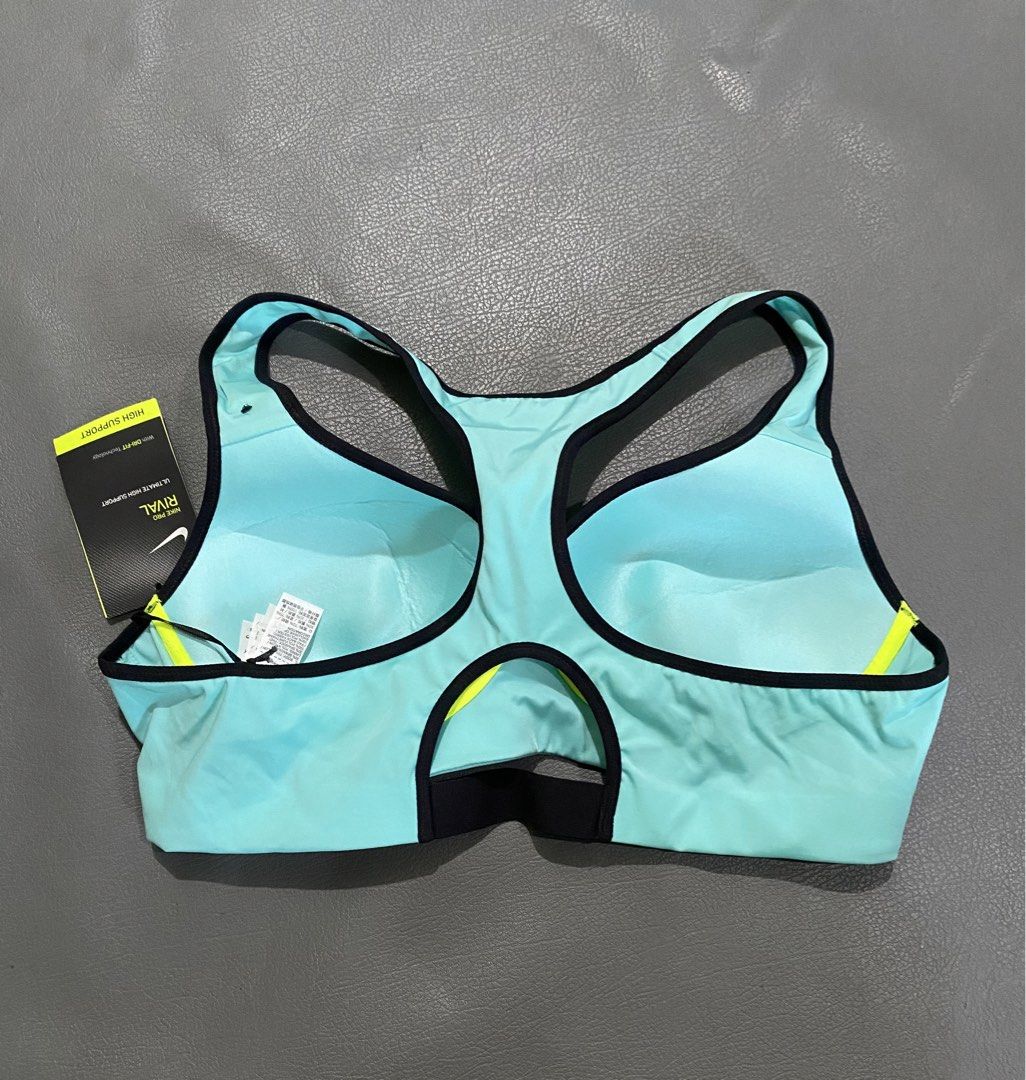 Nike Pro Rival Ultimate High Support Sports Bra 36A (Category: Activewear) located in Pozorrubio. Submitted by izaykite2g (Listing ID 1463384272, Image 2). Description: - Nike Pro Rival Sports Bra - Color: Teal with black trim - Size: 36A - Support Level: Ultimate High Support - Features: Dri-FIT technology, Racerback design - Ideal for: High-impact activities - Condition: Brand new with tags attached.
