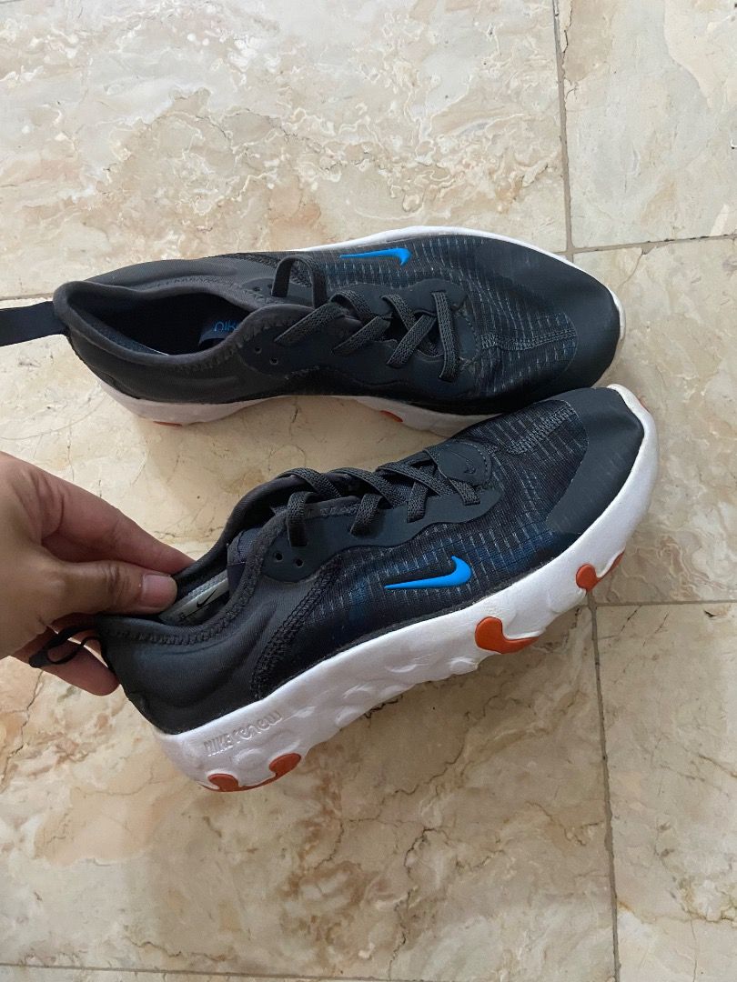 Nike React Vision Kids' Sneakers Black Blue Orange US1 (Category: Sneakers) located in Paranaque City. Submitted by sengloveima (Listing ID 1463396695, Image 2). Description: - Nike React Vision sneakers for kids - Size: 1Y (US) - Color: Black with blue swoosh and orange sole accents - Closure: Lace-up - Features: Comfortable and lightweight for everyday wear - Condition: Please check photos for details.