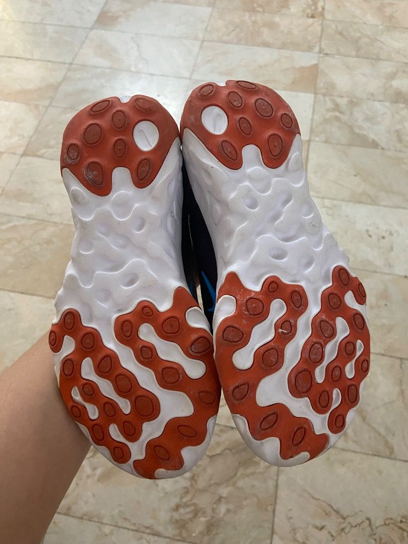 Nike React Vision Kids' Sneakers Black Blue Orange US1 (Category: Sneakers) located in Paranaque City. Submitted by sengloveima (Listing ID 1463396695, Image 3). Description: - Nike React Vision sneakers for kids - Size: 1Y (US) - Color: Black with blue swoosh and orange sole accents - Closure: Lace-up - Features: Comfortable and lightweight for everyday wear - Condition: Please check photos for details.