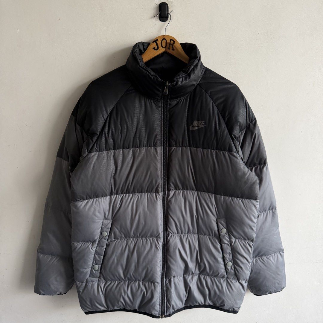 Nike Reversible Puffer Jacket (Category: Coats, Jackets and Outerwear) located in San Fernando. Submitted by jorjorr (Listing ID 1463390040, Image 1). Description: Nike Reversible Puffer Jacket Large on tag 23.5 width 29 length Exellent condition No issue P2,699.