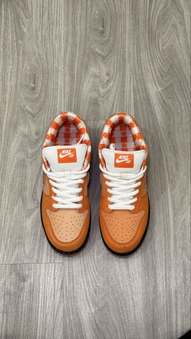 Nike SB Dunk Low Orange Lobster (Category: Sneakers) located in Manila. Submitted by silent_dosss (Listing ID 1463379831, Image 3). Description: - Orange Nike SB Dunks - Suede and leather upper - Unique gingham pattern on inner lining and tongue - Classic white laces and Swoosh - Durable black midsole - Ideal for skateboarding or casual wear.