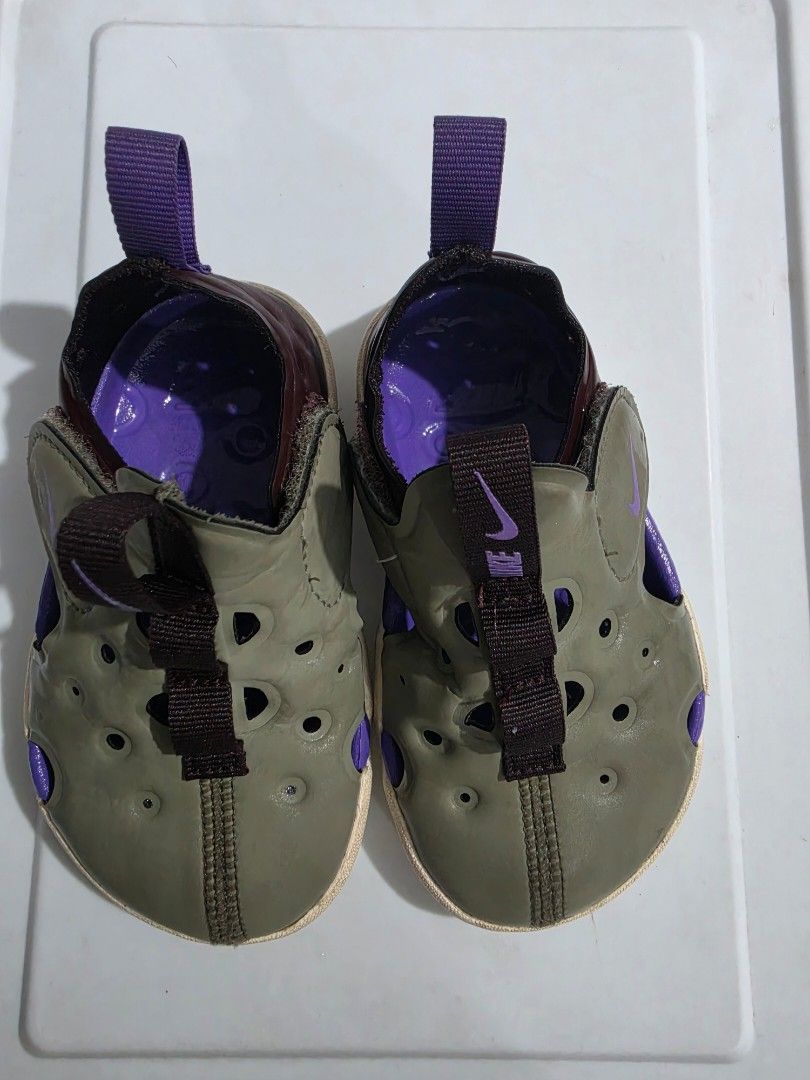 Nike Sunray Protect 4 Sandals (Category: Babies & Kids Fashion) located in Manila. Submitted by shieladmd (Listing ID 1463430954, Image 3). Description: - Nike Sunray Protect 4 Sandals in vibrant green and purple. - Features adjustable straps for a secure and customized fit. - Designed for easy slip-on and slip-off convenience. - Ideal for summer adventures and outdoor play. - Ensures comfort for little feet exploring the great outdoors..