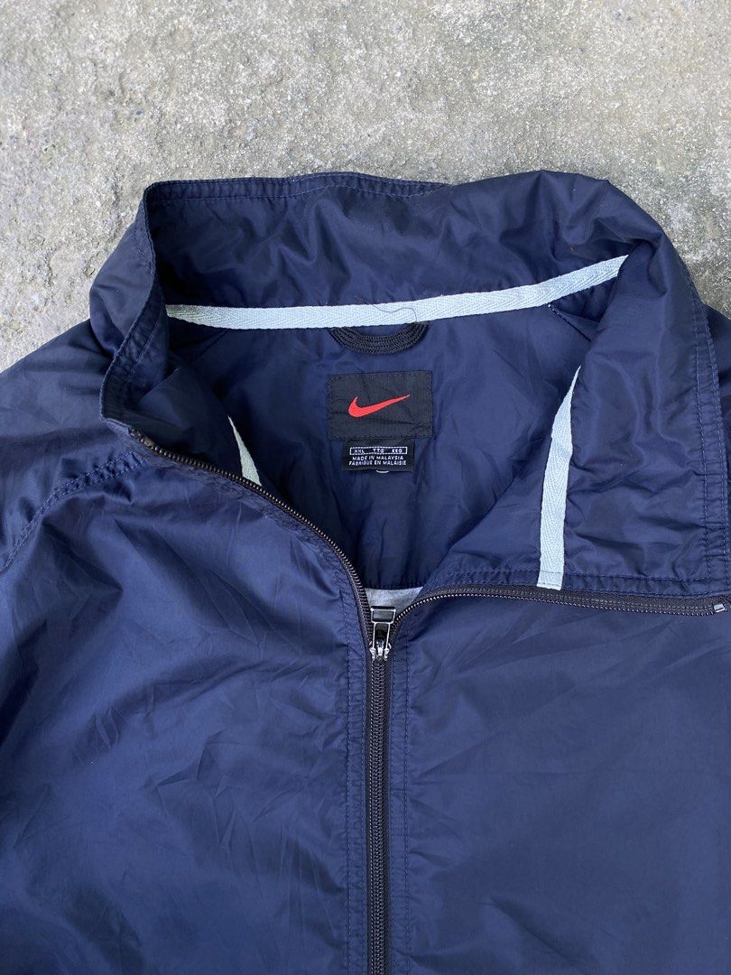 Nike Vintage Windbreaker Jacket (Category: Coats, Jackets and Outerwear) located in Manila. Submitted by zefrylle_co (Listing ID 1463445214, Image 3). Description: - Excellent condition - Two-tone - Ready to wear - Vintage 90's - No issue - Best fit XXL Measurement: 30x33 (XL-XXL) DM to purchase!!.