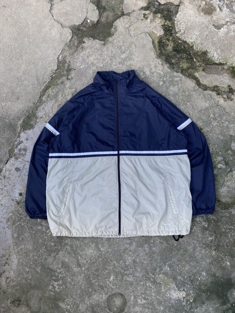 Nike Vintage Windbreaker Jacket (Category: Coats, Jackets and Outerwear) located in Manila. Submitted by zefrylle_co (Listing ID 1463445214, Image 1). Description: - Excellent condition - Two-tone - Ready to wear - Vintage 90's - No issue - Best fit XXL Measurement: 30x33 (XL-XXL) DM to purchase!!.