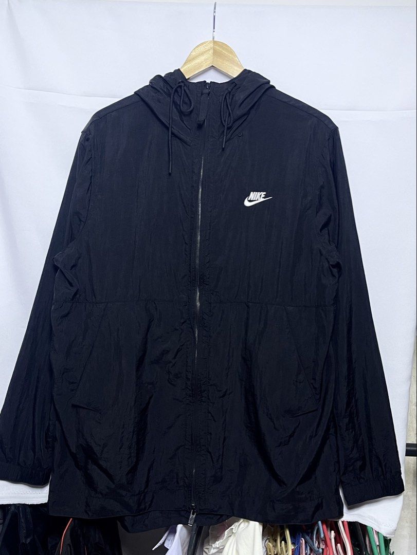 Nike Windbreaker Hooded Jacket (Category: Coats, Jackets and Outerwear) located in Manila. Submitted by hiddenvaultph (Listing ID 1463499429, Image 1). Description: Size: XL Width: 24 Length: 29 Color rate: 10/10 Like new condition No issue MOP: Gcash Shipping: JNT Location: Antipolo.