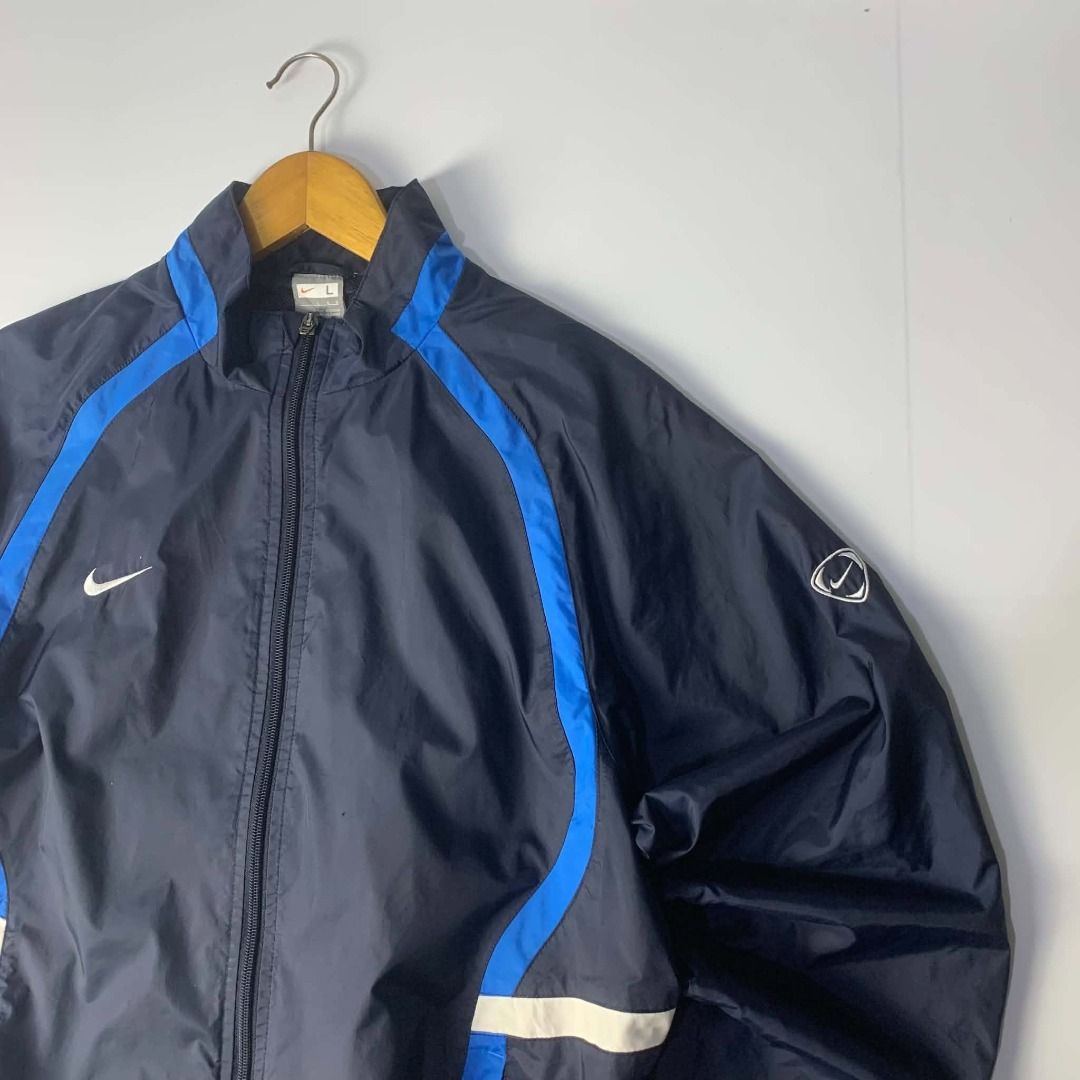 Nike Windbreaker Track Jacket (Category: Coats, Jackets and Outerwear) located in Quezon City. Submitted by nikolins (Listing ID 1463490286, Image 2). Description: Size L-XL 23 x 28 Issue: none.