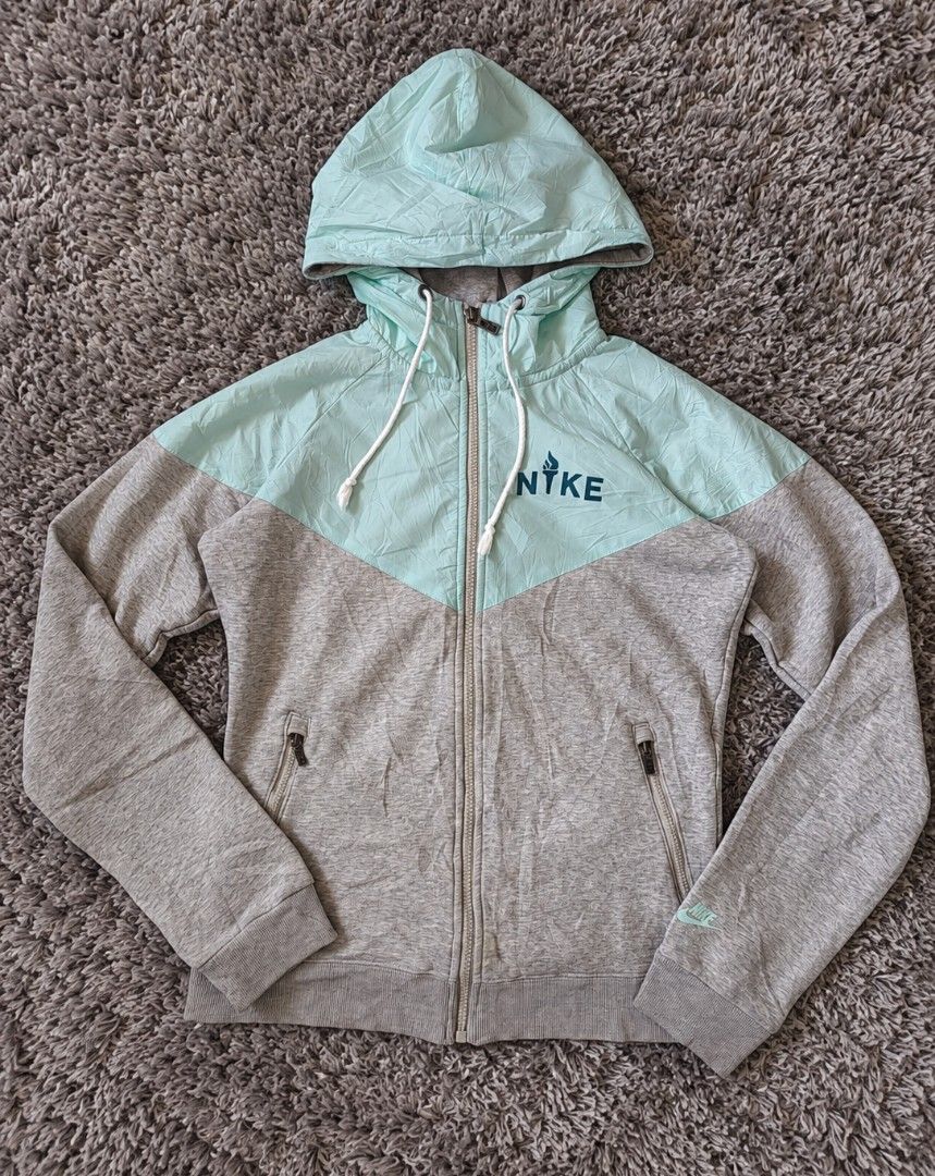 Nike Windrunner Full Zip Hoodie Mint Green Grey (Category: Coats, Jackets and Outerwear) located in Manila. Submitted by livedolphin_68dee2 (Listing ID 1463482028, Image 1). Description: - Lightweight Nike hoodie - Colorblock design: mint green and grey - Full zip front with pockets - Drawstring hood - Ideal for casual wear or light workouts.