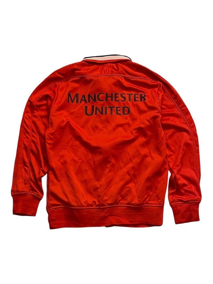 NIKE X MANCHESTER RED TRACK SUIT JACKET (Category: Coats, Jackets and Outerwear) located in Pasay City. Submitted by digital_wardrobe.ph (Listing ID 1463440658, Image 2). Description: NIKE X MANCHESTER RED TRACK SUIT JACKET details size: small - medium width: length: price: 650 minor issue: last pic location: pasay city.