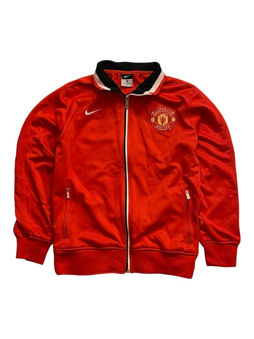 NIKE X MANCHESTER RED TRACK SUIT JACKET (Category: Coats, Jackets and Outerwear) located in Pasay City. Submitted by digital_wardrobe.ph (Listing ID 1463440658, Image 1). Description: NIKE X MANCHESTER RED TRACK SUIT JACKET details size: small - medium width: length: price: 650 minor issue: last pic location: pasay city.