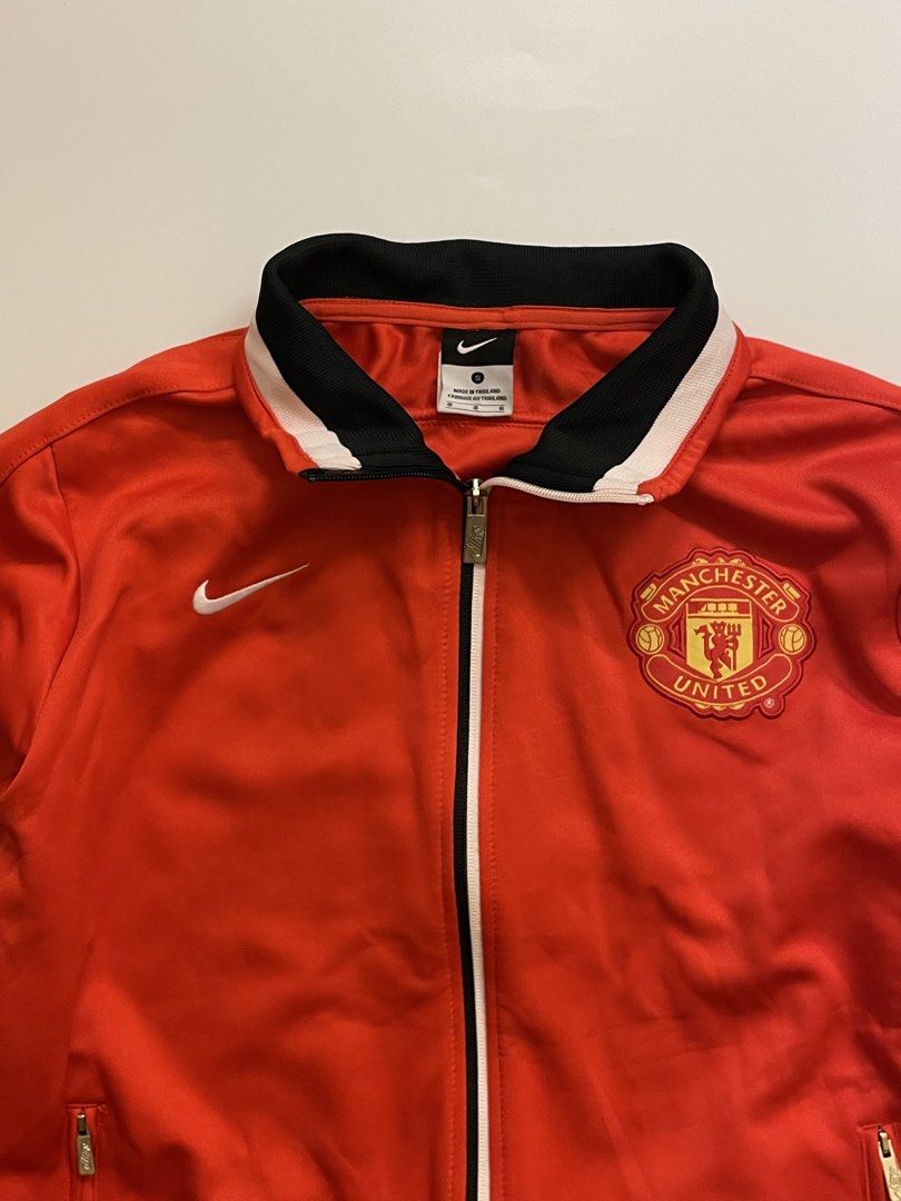 NIKE X MANCHESTER RED TRACK SUIT JACKET (Category: Coats, Jackets and Outerwear) located in Pasay City. Submitted by digital_wardrobe.ph (Listing ID 1463440658, Image 3). Description: NIKE X MANCHESTER RED TRACK SUIT JACKET details size: small - medium width: length: price: 650 minor issue: last pic location: pasay city.