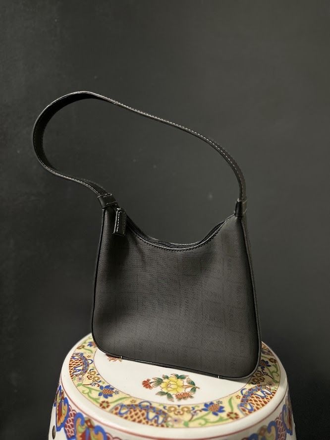 Nine West Black Shoulder Bag (Category: Shoulder Bags) located in Caloocan City. Submitted by zealgem_d3432f (Listing ID 1463528161, Image 2). Description: - Classic black shoulder bag from Nine & Company - Features a convenient front zip pocket - Comfortable strap for easy carrying - Simple and versatile design, ideal for everyday use - Perfectly fits your daily essentials Please feel free to message me if there are any inquiries or requests for
