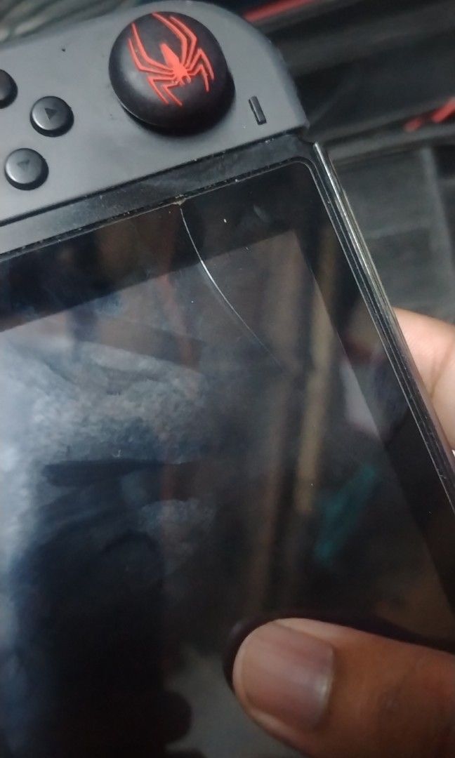 Nintendo switch v1 sechand (Category: Other Mobile & Gadget Accessories) located in Manila. Submitted by dosciento (Listing ID 1463339081, Image 3). Description: Issue: joycon Unit at charger lang at yung lagayan.