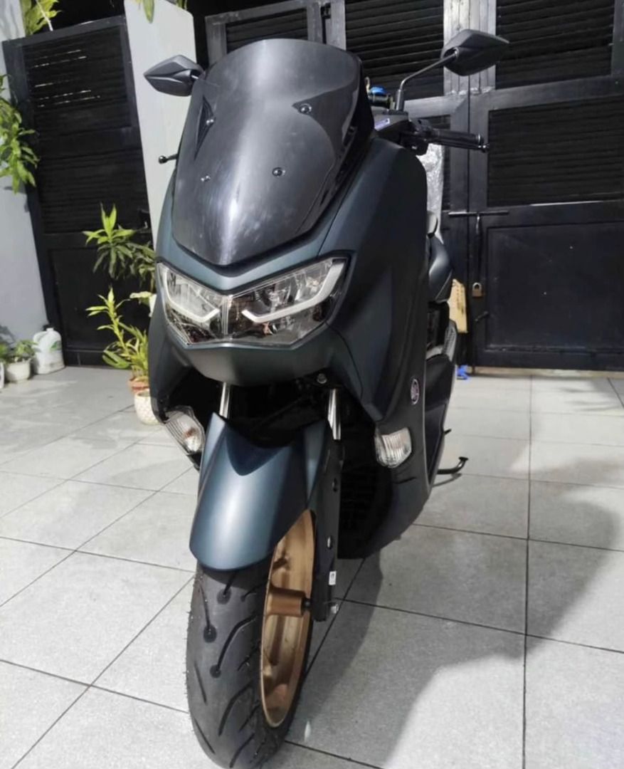 Nmax v2.1 2022 (Category: Motorbikes for Sale) located in Marikina City. Submitted by josht0117 (Listing ID 1463356415, Image 2). Description: Nmax 2022 v2.1 For sale Matte Green ABS TCS Y Connect KeyLess 1 Remote Key with Code 2 Compartment Keys Orig Odo 2k+ legit Odo kahit pascan rarely used All Stock electricals, Engine, CVT and mechanical parts with markings Pwde sa Maselan Installed Yamaha rear tire hugger Installed Front fender extension 1s