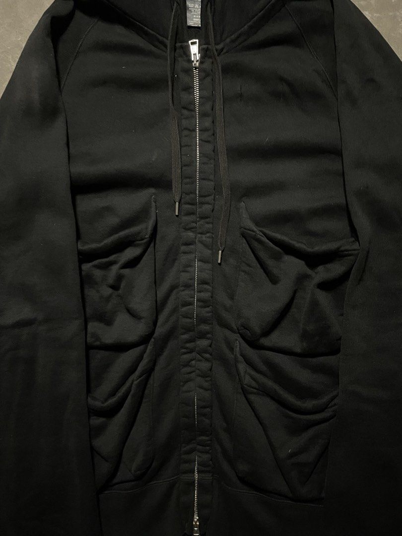 Number (N)ine - Cargo Hoodie (Category: Coats, Jackets and Outerwear) located in Taguig. Submitted by shakedaroom (Listing ID 1463550382, Image 2). Description: Post 2005 Number (N)ine Cargo Hoodie Size L (Size 3 on tag) Condition: 9/10 condo, has slight fade on the back shoulder part Guaranteed Authentic Measurements (inches): Chest: 19” Length: 28” Sleeve length: 32”.