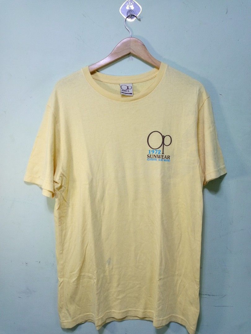 Ocean Pacific OP T-shirt Bundle (Category: Tshirts & Polo Shirts ) located in Manila. Submitted by onewikstraight (Listing ID 1463336149, Image 2). Description: - Two Ocean Pacific t-shirts - Navy blue tee: White and yellow stripe graphic on front, large graphic on back - Light yellow tee: Small OP logo and text on front, large graphic on back - Both are short-sleeved - Ideal for casual wear PM 📨📥 1100+sf.