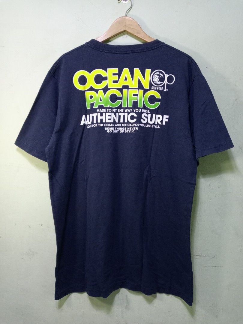 Ocean Pacific OP T-shirt Bundle (Category: Tshirts & Polo Shirts ) located in Manila. Submitted by onewikstraight (Listing ID 1463336149, Image 3). Description: - Two Ocean Pacific t-shirts - Navy blue tee: White and yellow stripe graphic on front, large graphic on back - Light yellow tee: Small OP logo and text on front, large graphic on back - Both are short-sleeved - Ideal for casual wear PM 📨📥 1100+sf.