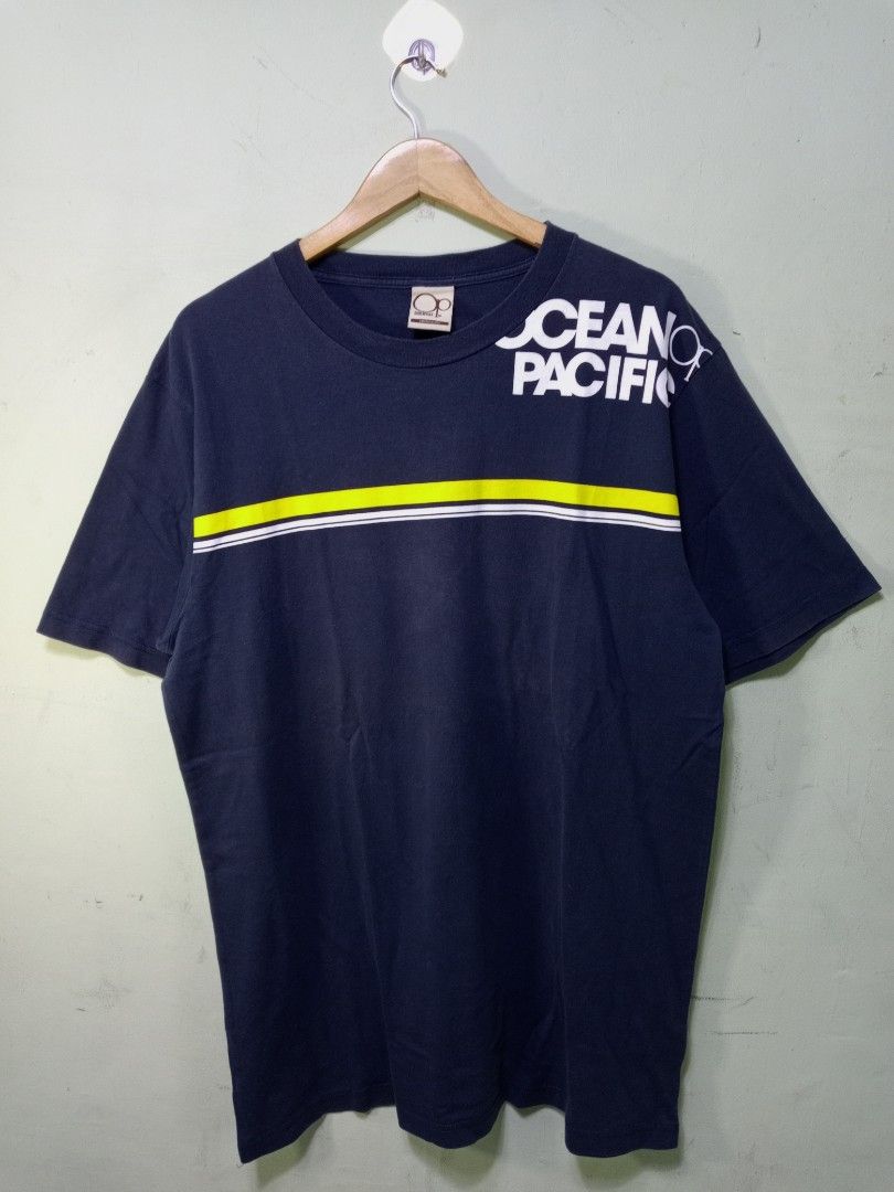 Ocean Pacific OP T-shirt Bundle (Category: Tshirts & Polo Shirts ) located in Manila. Submitted by onewikstraight (Listing ID 1463336149, Image 1). Description: - Two Ocean Pacific t-shirts - Navy blue tee: White and yellow stripe graphic on front, large graphic on back - Light yellow tee: Small OP logo and text on front, large graphic on back - Both are short-sleeved - Ideal for casual wear PM 📨📥 1100+sf.