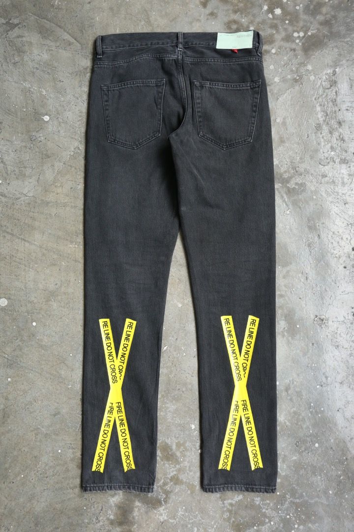 Off-White - S/S 18 - Firetape-Logo Denim Jean (Category: Jeans) located in Manila. Submitted by graymatter_ (Listing ID 1463443414, Image 1). Description: Off-White - S/S 18 - Firetape-Logo Denim Jean Tagged Size: 30 Fit: Slim Condition: 9/10 Flaws: Removed Main Tag Material: 100% Cotton Zipper: YKK Made in: Italy Dimensions Waist: 33 Inseam: 32 Crotch: 12 Thigh: 11 Leg Opening: 6.5 .
