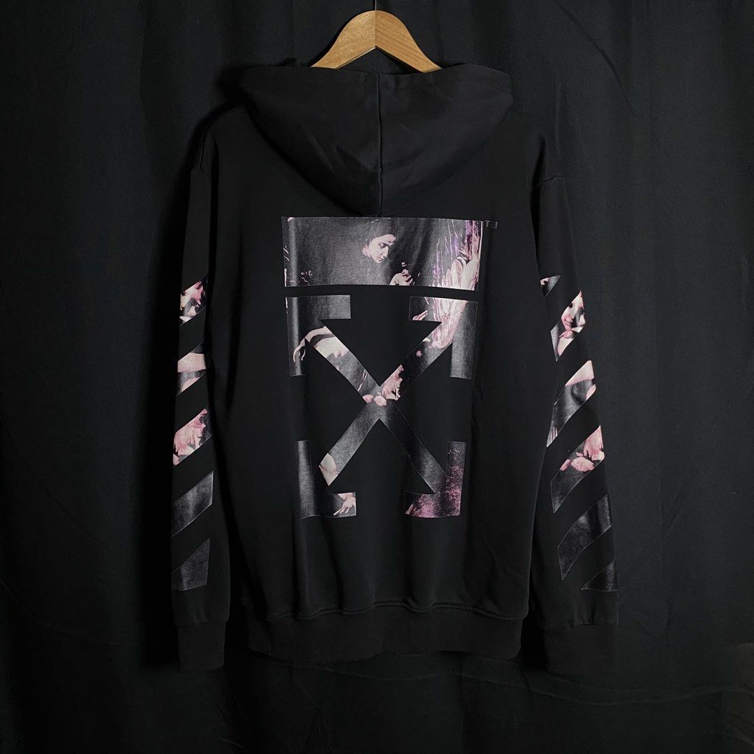 OFF-WHITE Caravaggio Arrows Hoodie (Category: Coats, Jackets and Outerwear) located in Manila. Submitted by curatedvg. (Listing ID 1463479121, Image 2). Description: OFF-WHITE Caravaggio Hoodie Jacket in Black Width: 23 inches Length: 28.5 inches Size L / Large Excellent condition No issues No pinholes or crackprint OFF only Interested? Send a message or offer. 📥.