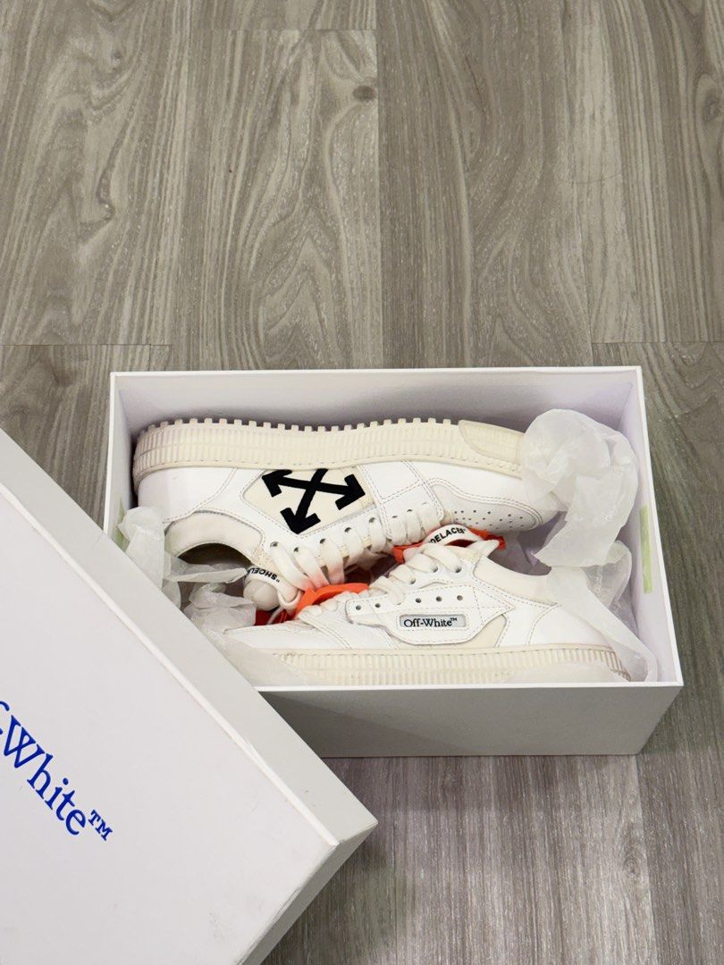 Off-White Low Vulcanized Sneakers White (Category: Sneakers) located in Manila. Submitted by silent_dosss (Listing ID 1463379326, Image 1). Description: - Authentic Off-White Low Vulcanized sneakers - Classic white leather design - Features iconic orange tag detail - Includes original Off-White box - Essential streetwear staple.