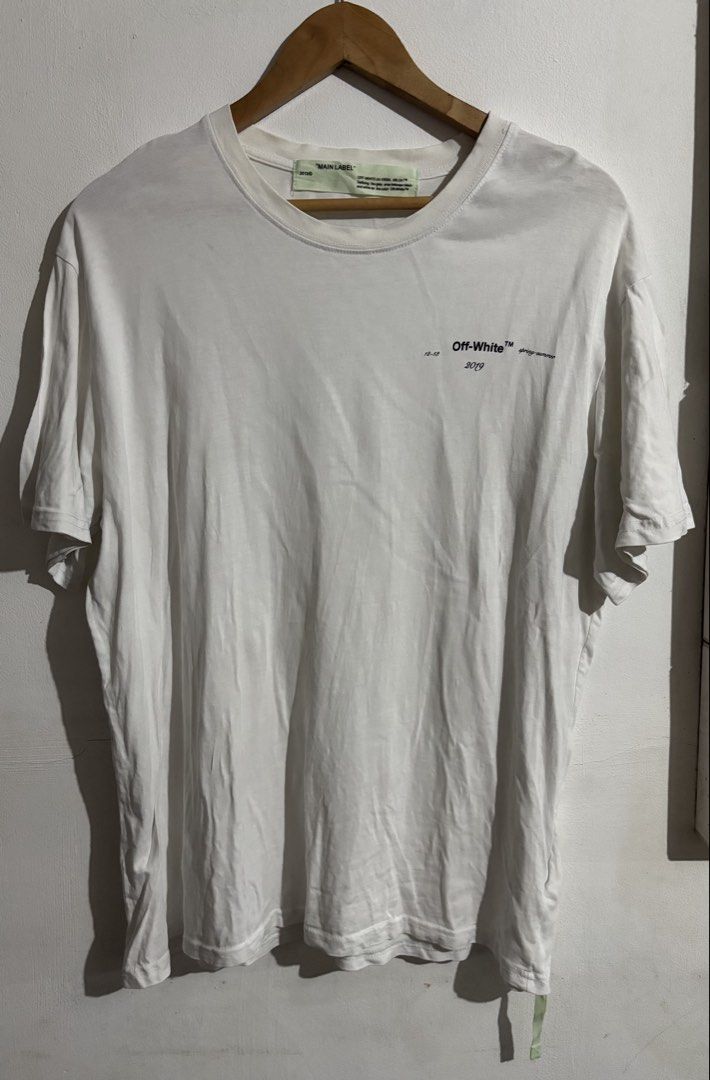 OFF-WHITE "MAIN LABEL" 2019 Spring Summer T-Shirt (Category: Tshirts & Polo Shirts ) located in Naga. Submitted by ajrc.shop (Listing ID 1463469702, Image 1). Description: Offwhite tshirt ✅Size: L ✅Width: 22 ✅Length: 27.5 ✅Color Rate: 9/10 ✅Issue: Loose neckline&hairlines ✅Need Wash ✅Location: Bicol Naga City, Camarines Sur ✅Courier: J&T Express/Flash Express ✅MOP: Gcash only.