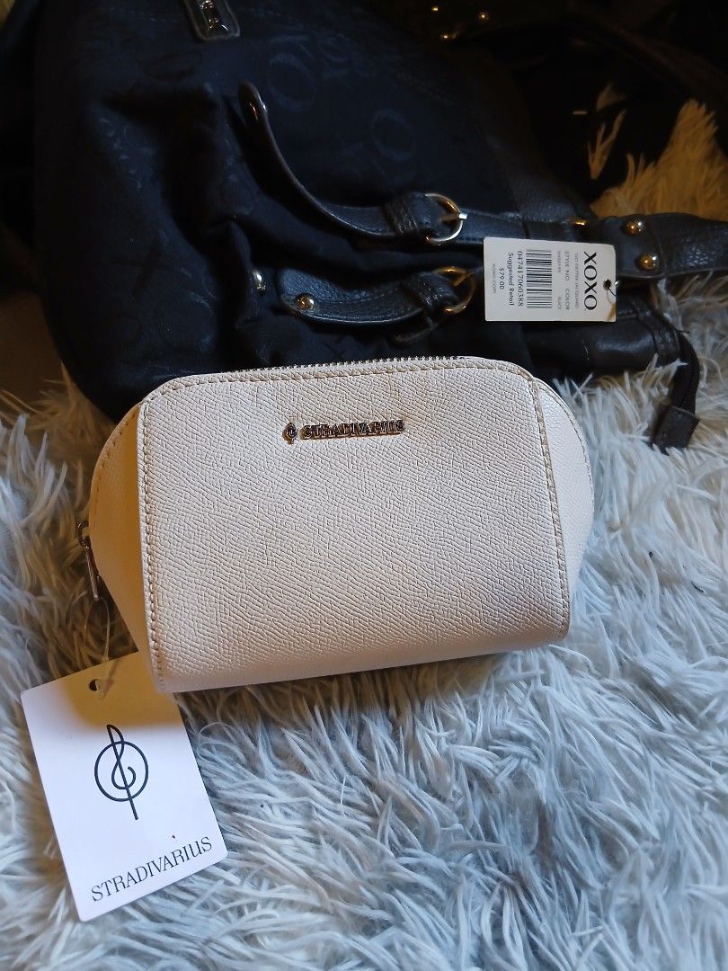OG stradivarius pouch dirty white (Category: Purses & Pouches) located in Calumpit. Submitted by collectionspurses (Listing ID 1463351507, Image 1). Description: Old stock but brand new, dirty white, Thick quality ! :) O.G Branded..