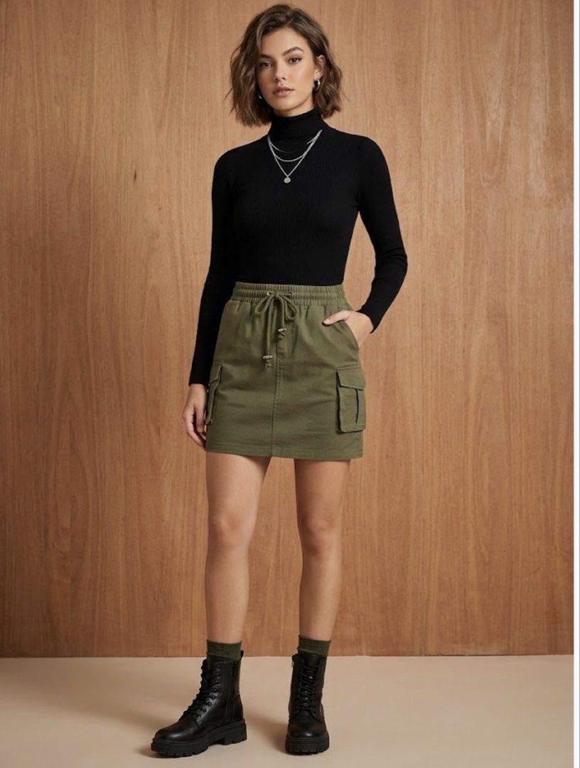 Olive Green Cargo Mini Skirt with Drawstring Waist (Category: Skirts) located in Taguig. Submitted by peanutcoconut (Listing ID 1463484930, Image 1). Description: - Cute olive green cargo mini skirt - Stretchy drawstring waist for a comfy fit - Two side pockets and two front flap pockets - Drawstring hem for adjustable fit - Ideal for casual outfits.