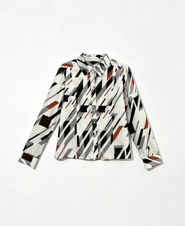 OLIVIA LAUREN (Category: Longsleeves) located in Davao. Submitted by sart0ria85 (Listing ID 1463369340, Image 1). Description: A geometric pattern of orange gray and black. Label is no longer clear. SMALL. Size 4 EXCELLENT CONDITION (95/100).