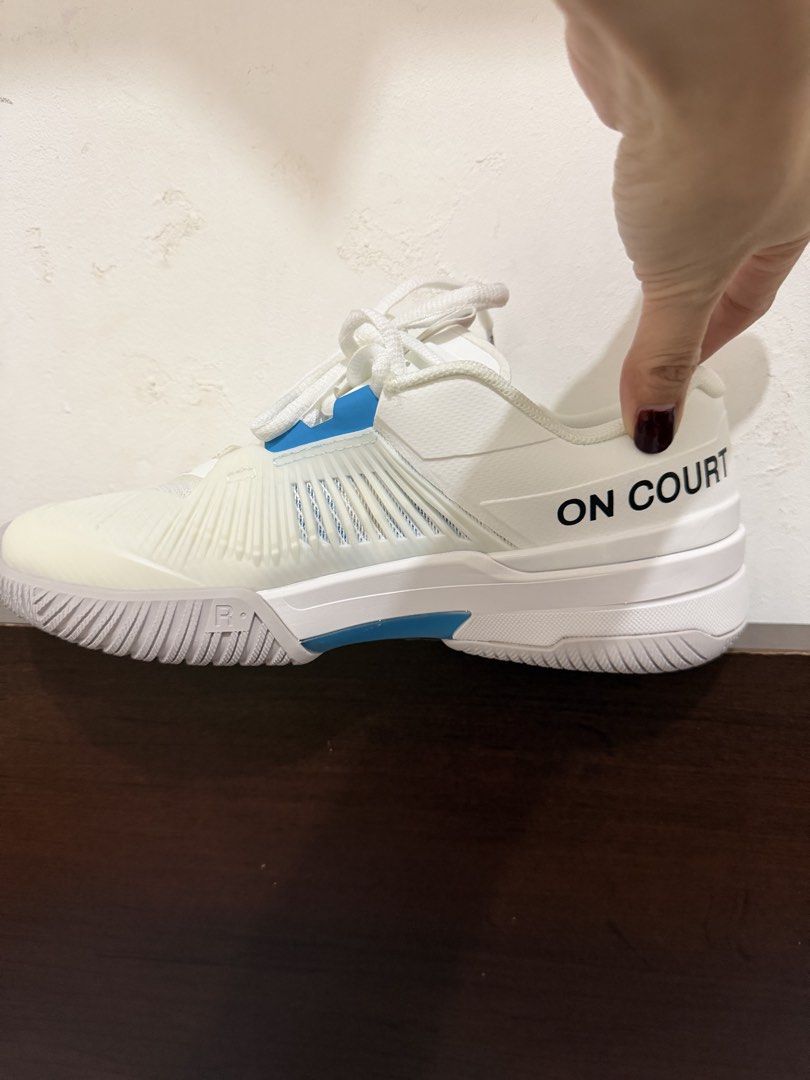 ONCloud women Roger Pro (Category: Sneakers) located in Cebu City. Submitted by shopnsave2015 (Listing ID 1463371330, Image 3). Description: On The Roger Pro Fire tennis shoes in white and pink, featuring a clean mesh upper with vibrant magenta and blue details. Size 8 Topgrade .
