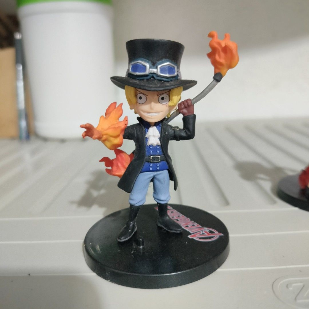One Piece Ace & Sabo Action Figures Set (Category: Figurines & Statues) located in Plaridel. Submitted by klayskolektibols (Listing ID 1463499509, Image 2). Description: - Set of 2 One Piece action figures - Features Ace and Sabo - Both figures have dynamic fire effects - Ideal for any One Piece fan's collection - Can be displayed together or individually - Each figure comes with its own base.