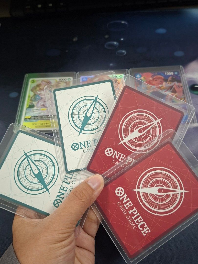 One Piece Card Game Cards Bundle 50 pcs (Category: Raw Singles) located in Muntinlupa City. Submitted by jsassorteditems (Listing ID 1463452307, Image 1). Description: - Bundle of One Piece Card Game cards 50 pcs - Includes multiple complete decks - Also includes various individual cards - Some cards are protected in sleeves - Ideal for both collectors and players - Great value lot for your collection!.