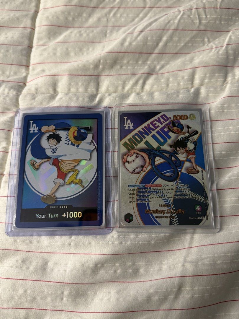 One Piece Monkey D. Luffy Leader Card & DON!! DODGERS (Category: Raw Singles) located in Makati City. Submitted by arkera.274 (Listing ID 1463499028, Image 1). Description: Selling two One Piece cards. One is a Leader card for Monkey D. Luffy, Straw Hat Crew. The other is a DON! From dodgers night! .