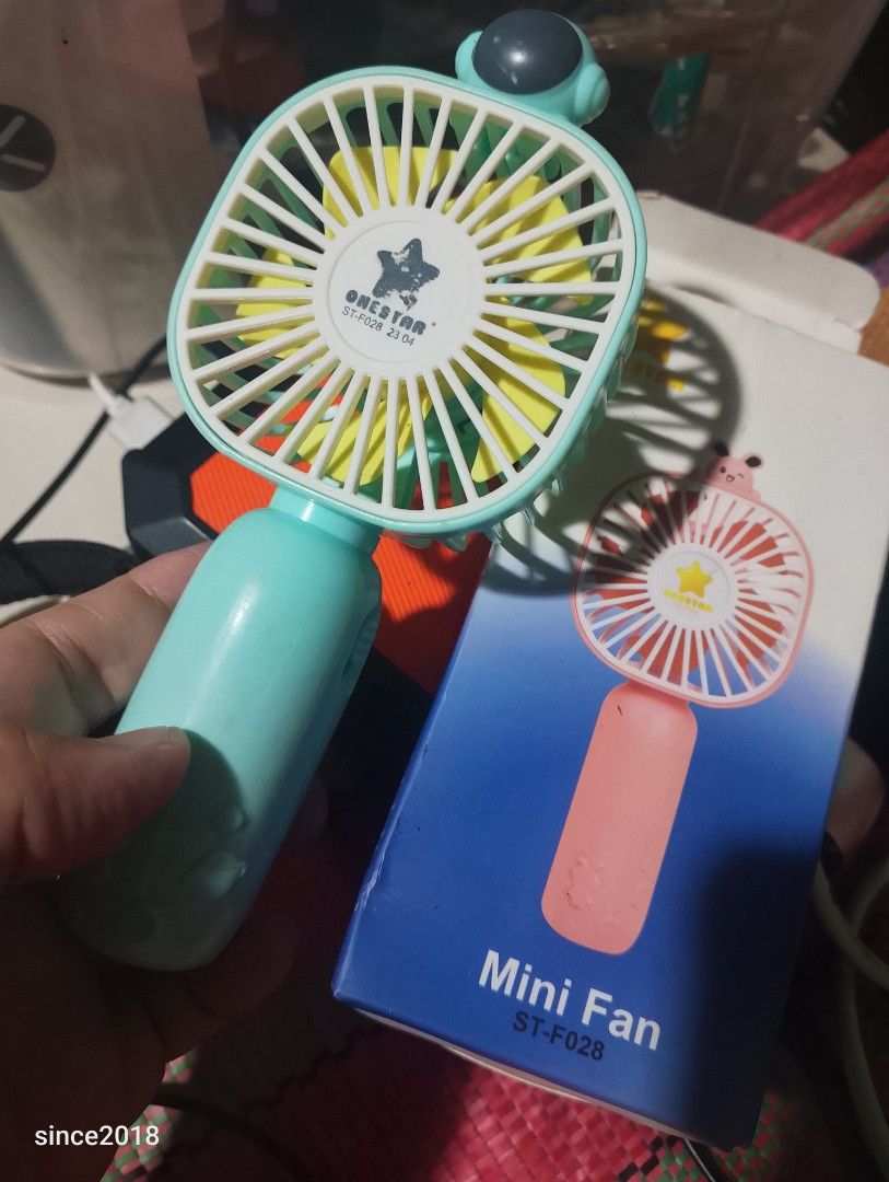 ONESTAR ST-F028 Mini USB Rechargeable Fan (Category: Fans) located in Quezon City. Submitted by sellingwithlove2018 (Listing ID 1463349314, Image 1). Description: - Adorable astronaut-themed mini fan - USB rechargeable (2-3 hour charge time) - Approximately 1 hour of usage time - Ideal for personal cooling anywhere - Comes with original box - Please charge fully before first use -Hindi pa nagagamit pm me for the video.