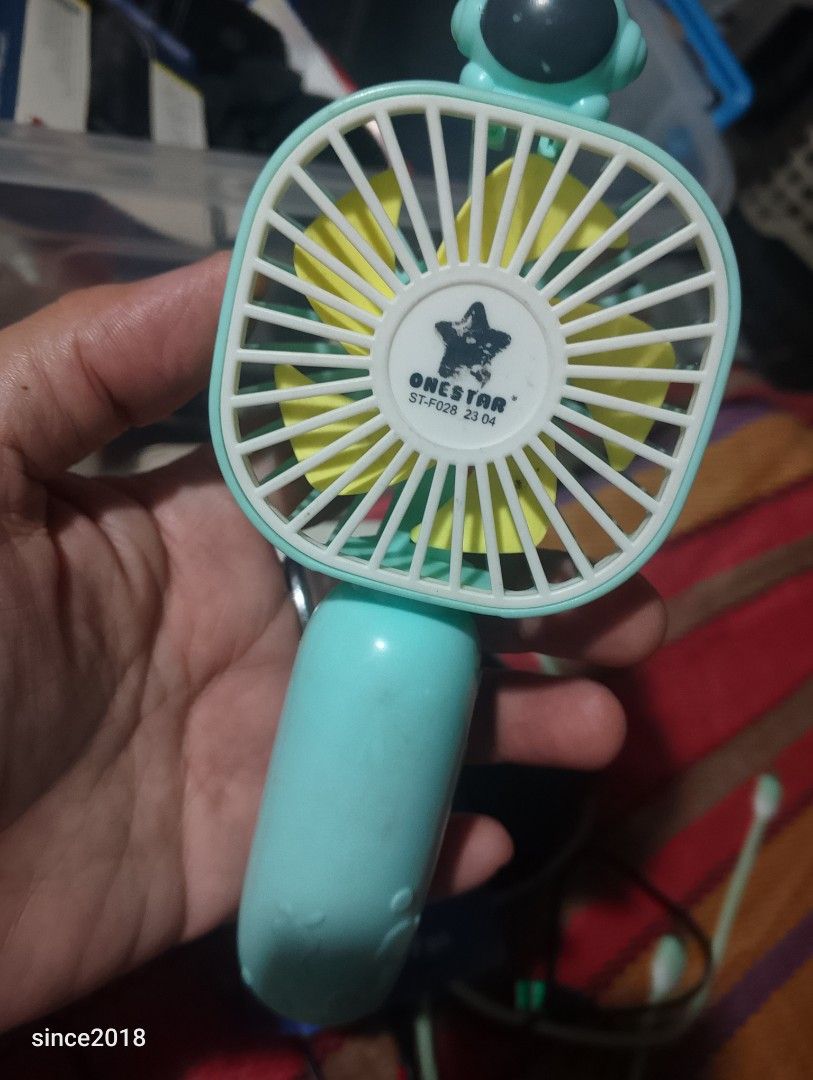 ONESTAR ST-F028 Mini USB Rechargeable Fan (Category: Fans) located in Quezon City. Submitted by sellingwithlove2018 (Listing ID 1463349314, Image 2). Description: - Adorable astronaut-themed mini fan - USB rechargeable (2-3 hour charge time) - Approximately 1 hour of usage time - Ideal for personal cooling anywhere - Comes with original box - Please charge fully before first use -Hindi pa nagagamit pm me for the video.