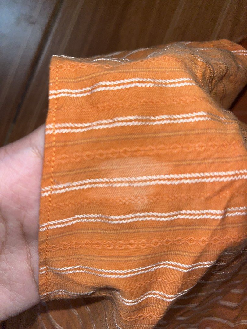Orange Striped One-Shoulder Tie Top (Category: Sleeveless) located in Caloocan City. Submitted by irstmr (Listing ID 1463508859, Image 3). Description: upcycled top made of thrifted polo shirt 🧡 important note: have a unnoticeable white stain at the back visit @missfitsmnl on IG for more.